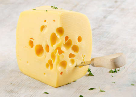 Cheese on wooden tableの写真素材