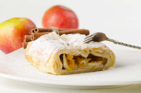 Sweet apple pie and red applesの写真素材