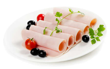 Slices of ham and vegetablesの写真素材
