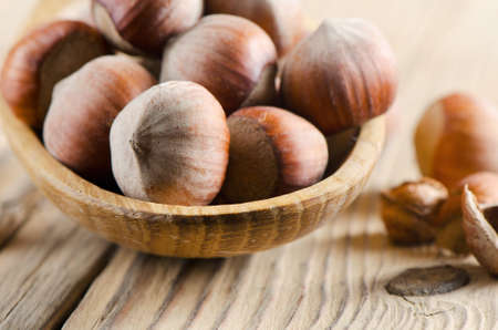 Hazelnuts on a wooden table.Selective focusの写真素材