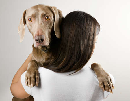 young woman with her dogの写真素材