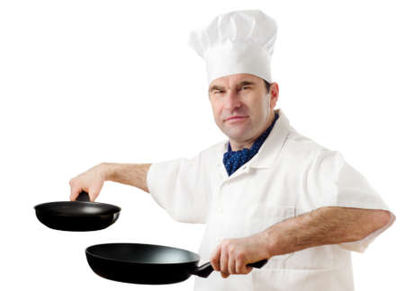 Chef  with  two frying pans isolated  on whiteの写真素材