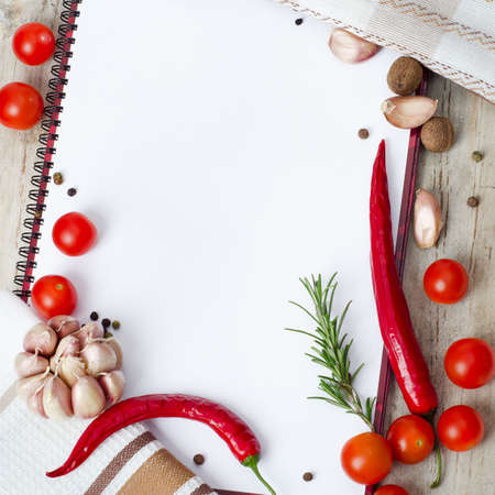 Empty notebook  ready for recipes on a wooden tableの写真素材