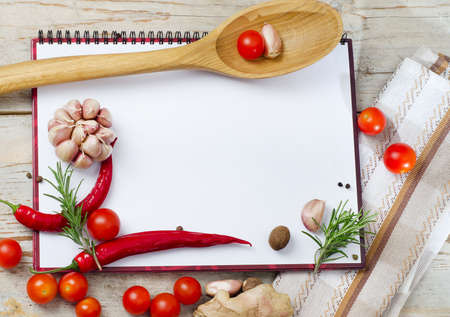 Empty book  ready for recipes or menu on a wooden tableの写真素材