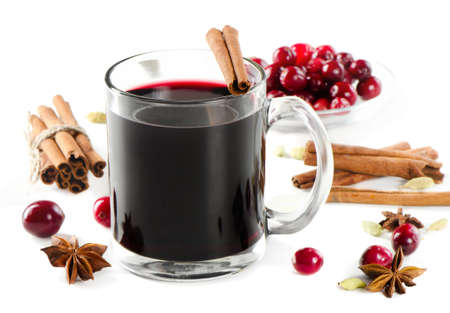 mulled wine with spices isolated on whiteの写真素材