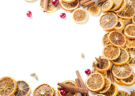spices and dried oranges isolated on white backgroundの写真素材
