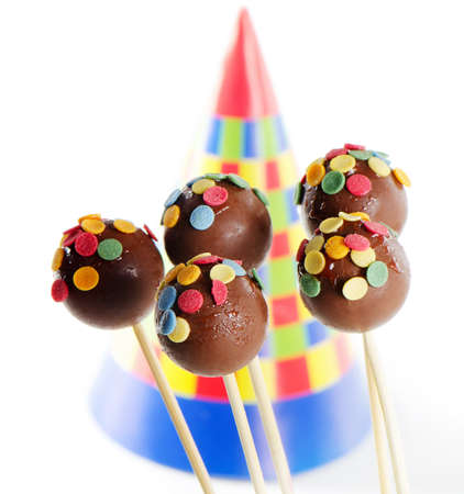 Colorful cake pops isolated on whiteの写真素材