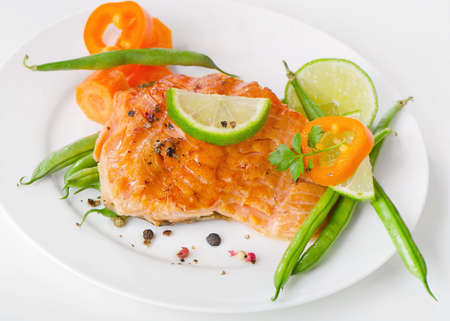 Grilled salmon and vegetablesの写真素材