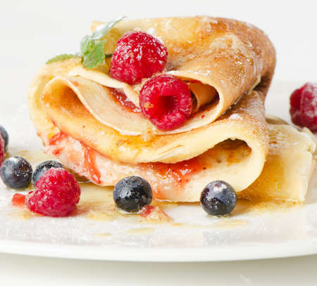 Sweet crepes with berriesの写真素材