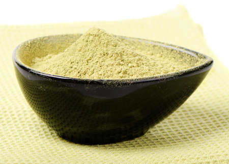 powdered green tea isolated on white background Selective focusの写真素材