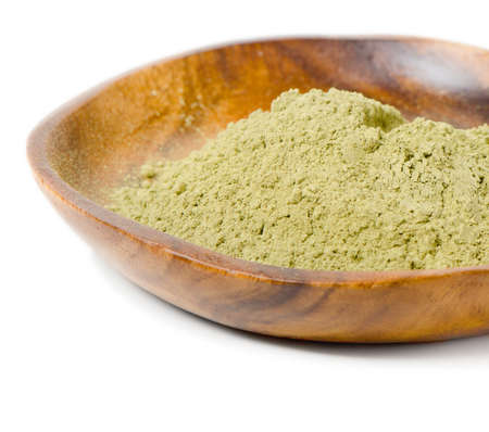 powdered green tea isolated on white background Selective focusの写真素材