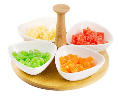 sweet candied dried fruits isolated on a white backgroundの写真素材