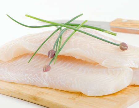 Fillet of fresh fish with herbs  Selective focusの写真素材