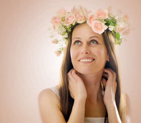 Beautiful  woman with flower wreath.Vintage styled  portraitの写真素材