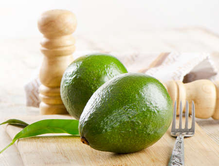 Avocado on a wooden table Selective focusの写真素材