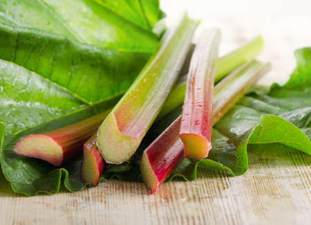 Rhubarb on a wooden table Selective focusの写真素材