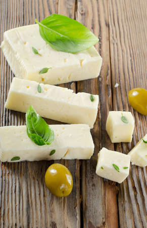 Feta cheese and  green olivesの写真素材