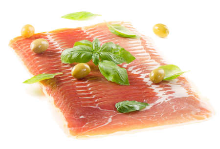 Slices of cured ham isolated on white backgroundの写真素材