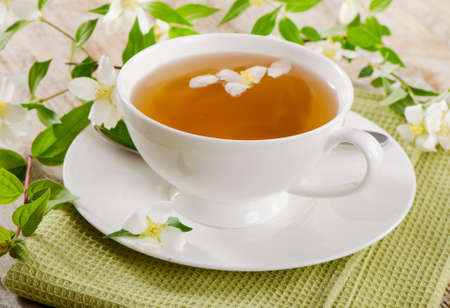 Jasmine tea on a wooden tableの写真素材
