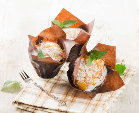 Homemade Muffins on  wooden tableの写真素材