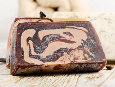 Handmade Soap with fresh orange on a wooden table.Selective focusの写真素材