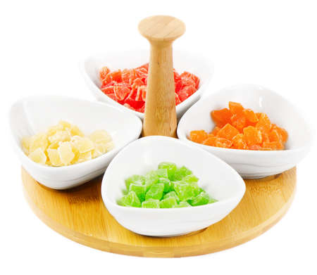sweet candied dried fruits isolated on a white backgroundの写真素材