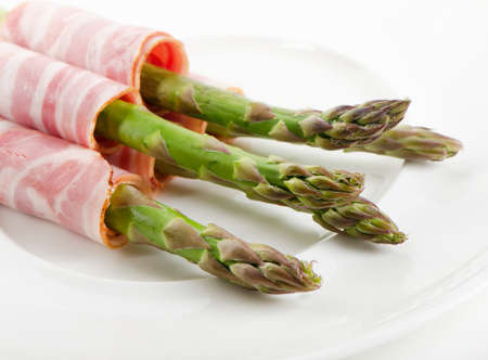 asparagus served with ham.Selective focusの写真素材
