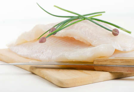 Fillet of fresh fish with herbs. Selective focusの写真素材