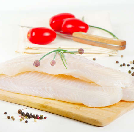 Fillet of fresh fish with herbs. Selective focusの写真素材