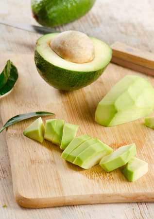 Avocado on a  wooden table.Selective focusの写真素材
