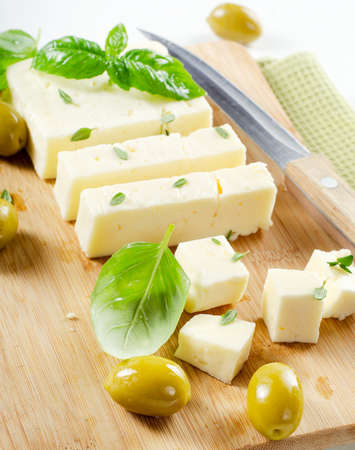 Feta cheese on a wooden platter .Selective focusの写真素材