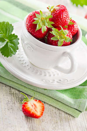 Fresh strawberries on  wooden table .Selective focusの写真素材