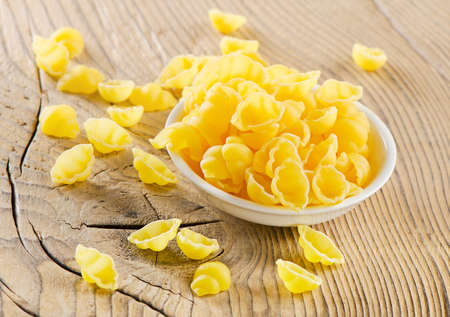 Pasta on a wooden table. Selective focusの写真素材