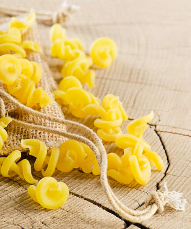 Pasta on a wooden table. Selective focusの写真素材