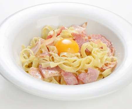 Pasta Carbonara on a white plate. Selective focusの写真素材