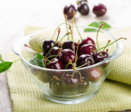 Cherries in the glass bowl. Selective focusの写真素材