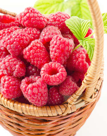 Fresh raspberries in the basketの写真素材