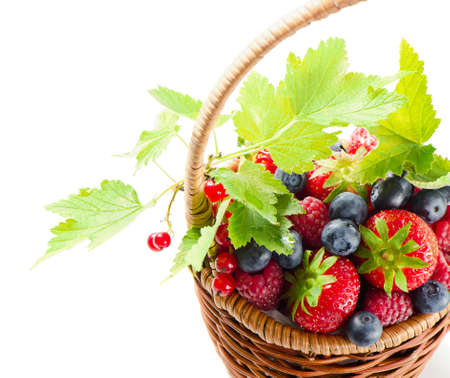 Fresh berries in the basket isolated on white background