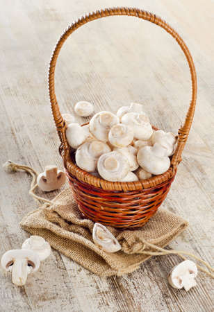 Mushrooms on a wooden tableの写真素材
