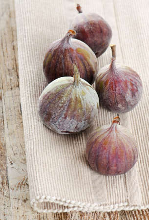 fresh figs on a wooden tableの写真素材