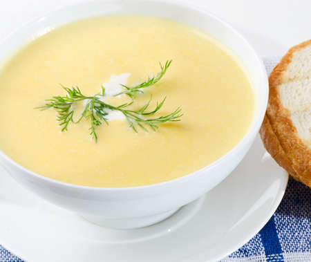 Creamy soup on a wooden tableの写真素材