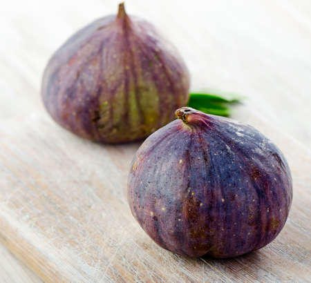 fresh figs on  wooden table  Selective focusの写真素材