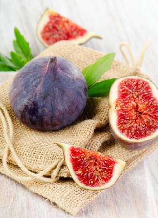 fresh figs on  wooden table. Selective focusの写真素材