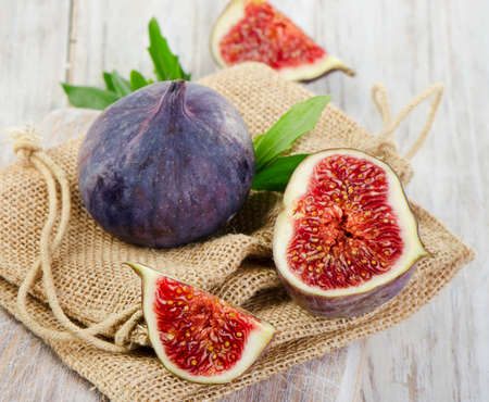 fresh figs on  wooden table. Selective focusの写真素材