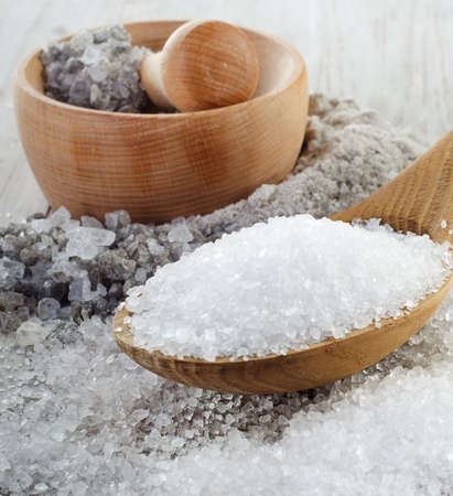 Salt on a wooden table Selective focusの写真素材