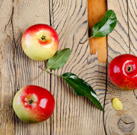 Apples on wooden backgroundの写真素材