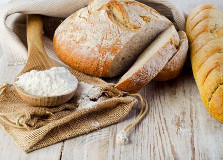Bread on wooden table. Selective focus