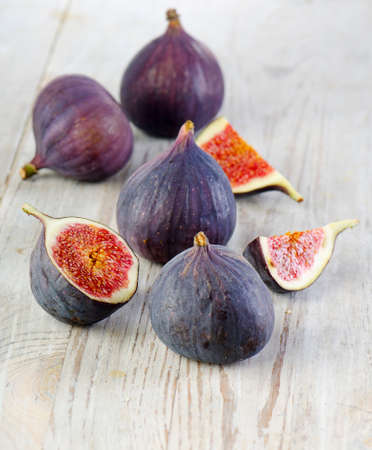 Figs on wooden table. Selective focus