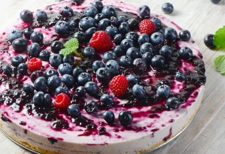 Cake with cream cheese and  berries. Selective focusの写真素材