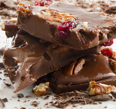 Broken chocolate  and nuts . Selective focusの写真素材